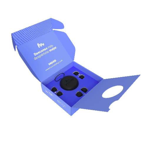 Interior de la caja Mood Focus azul con estuche circular negro y almohadillas de repuesto; incluye el eslogan Descansa más, despiértate mejor.