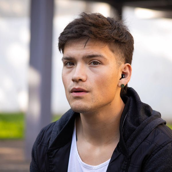 Tapones para los oídos reutilizables Mood Earplugs Chill Black, diseño discreto y cómodo para uso diario.